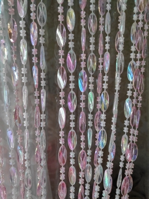 Штора из бусин Овал перламутровый, розового прозрачного цвета (фото, Штора из бусин Овал перламутровый, розового прозрачного цвета для зонирования)